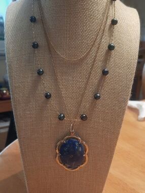 Layered Gold Necklace with Blue Stone Pendant and Dark Bead Accents